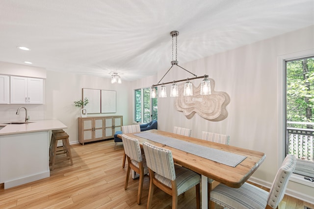 9773 Weko Dr, Bridgman, MI 49106 - dining area featuring light wood-style flooring, recessed lighting, and baseboards