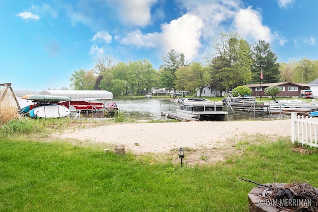 8220 Indian Shores Dr, Howard City, MI 49329 - view of yard featuring a water view, a dock, and an outdoor fire pit