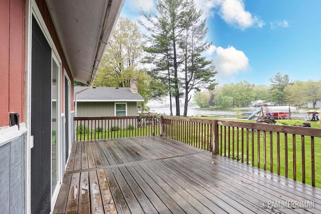 8220 Indian Shores Dr, Howard City, MI 49329 - deck with a water view and a yard