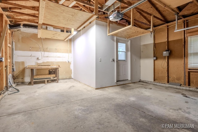 8220 Indian Shores Dr, Howard City, MI 49329 - garage with a garage door opener