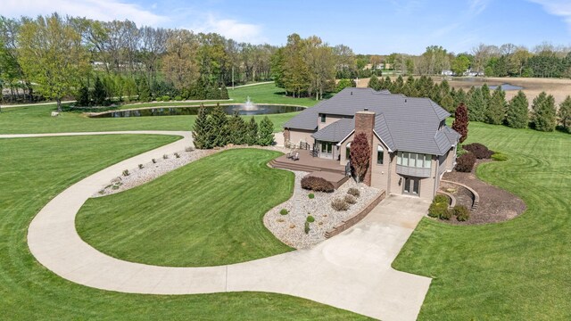 4624 Parman Rd, Stockbridge, MI 49285 - view from above of property with a nearby body of water and a tree filled landscape