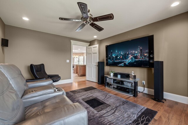 4624 Parman Rd, Stockbridge, MI 49285 - living area featuring a ceiling fan, baseboards, wood finished floors, and recessed lighting