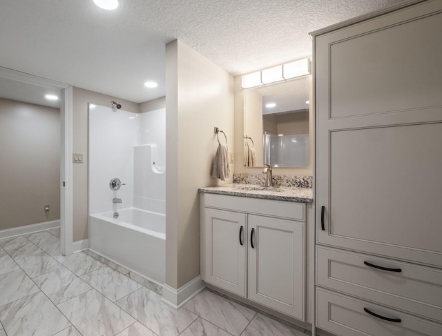 4624 Parman Rd, Stockbridge, MI 49285 - bathroom featuring marble look tiles, baseboards, vanity, bathing tub / shower combination, and recessed lighting