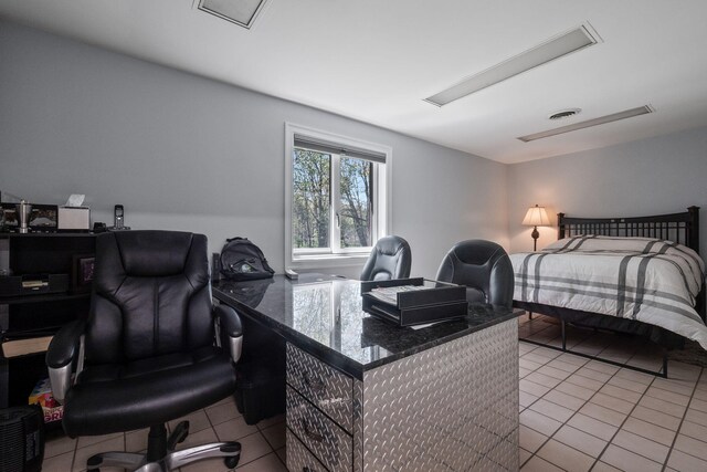 4624 Parman Rd, Stockbridge, MI 49285 - bedroom featuring light tile patterned floors and a desk