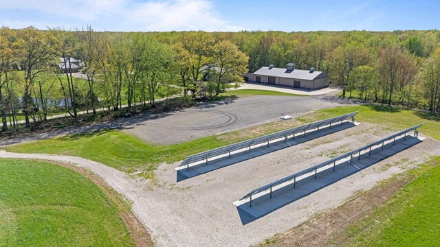 4624 Parman Rd, Stockbridge, MI 49285 - view from above of property with a heavily wooded area