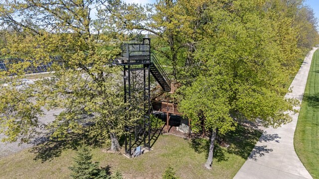 4624 Parman Rd, Stockbridge, MI 49285 - view of home's community featuring a wooden deck and stairs