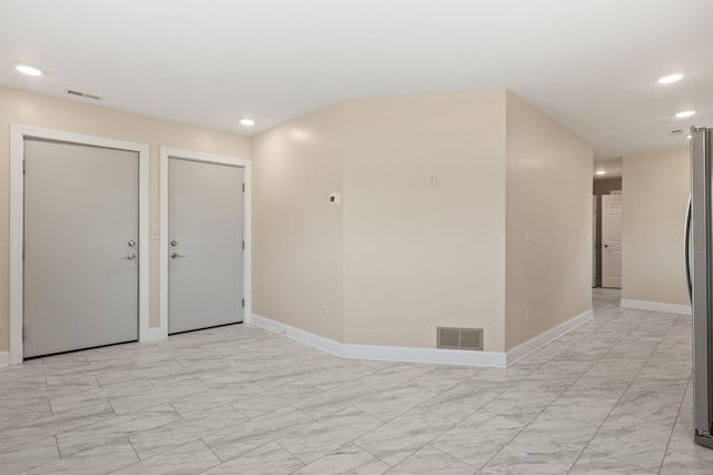 4624 Parman Rd, Stockbridge, MI 49285 - unfurnished room with recessed lighting, baseboards, and light marble finish floors