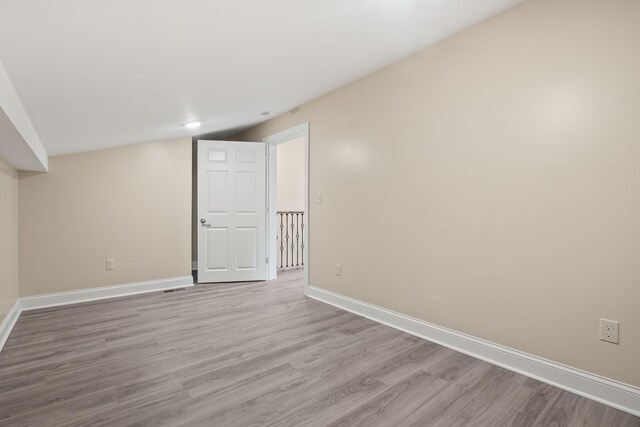 4624 Parman Rd, Stockbridge, MI 49285 - basement with wood finished floors and baseboards