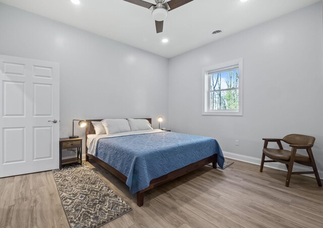 4624 Parman Rd, Stockbridge, MI 49285 - bedroom featuring light wood-style floors, baseboards, ceiling fan, and recessed lighting