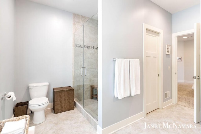 2078 Chippewa Dr Unit 25, Holland, MI 49424 - full bathroom featuring toilet, a shower stall, baseboards, and tile patterned flooring