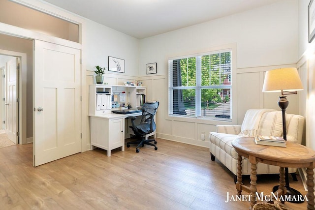 2078 Chippewa Dr Unit 25, Holland, MI 49424 - office area with a decorative wall, light wood finished floors, and wainscoting