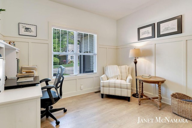 2078 Chippewa Dr Unit 25, Holland, MI 49424 - office with a decorative wall, light wood finished floors, and a wainscoted wall