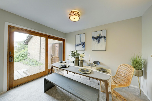 843 Greenhills Dr, Ann Arbor, MI 48105 - dining room with light carpet and baseboards