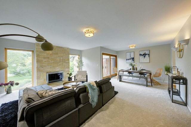 843 Greenhills Dr, Ann Arbor, MI 48105 - living room with carpet floors, a fireplace, and baseboards