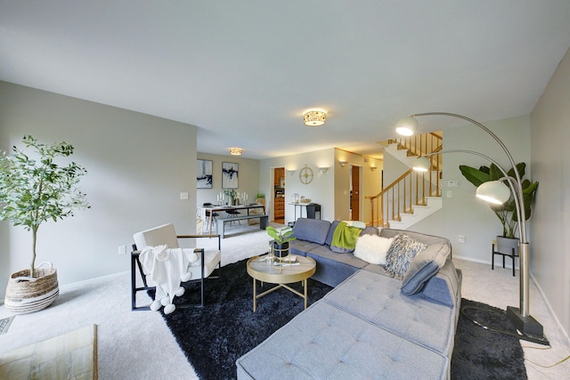 843 Greenhills Dr, Ann Arbor, MI 48105 - carpeted living area with stairway and baseboards