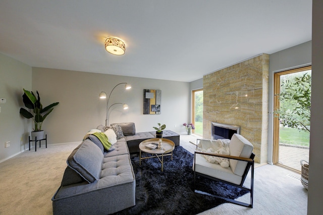 843 Greenhills Dr, Ann Arbor, MI 48105 - living area featuring carpet and a stone fireplace