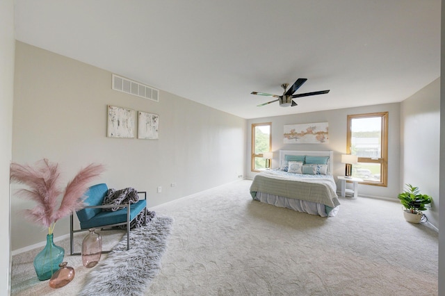 843 Greenhills Dr, Ann Arbor, MI 48105 - carpeted bedroom with ceiling fan and baseboards