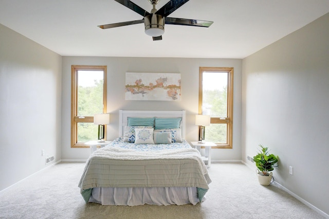 843 Greenhills Dr, Ann Arbor, MI 48105 - bedroom featuring light colored carpet, baseboards, and ceiling fan