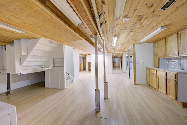 843 Greenhills Dr, Ann Arbor, MI 48105 - basement with stairs, light wood-style flooring, a sink, and wooden ceiling