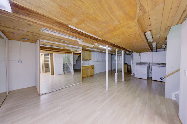 843 Greenhills Dr, Ann Arbor, MI 48105 - finished below grade area with washing machine and dryer, stairs, wooden ceiling, and light wood finished floors