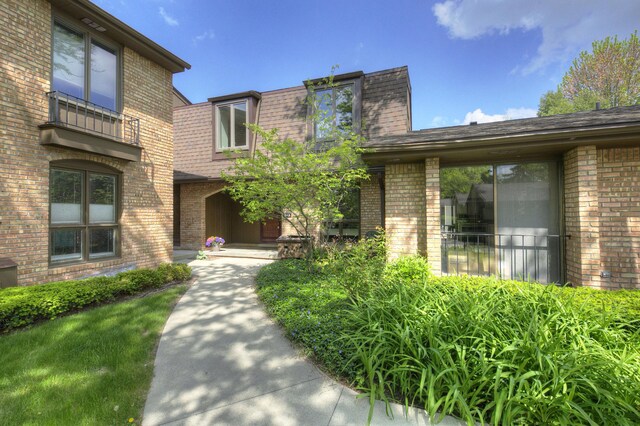 843 Greenhills Dr, Ann Arbor, MI 48105 - entrance to property with brick siding