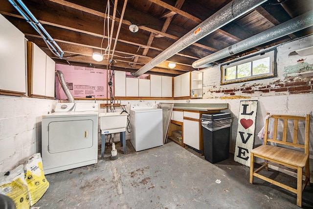 237 E Main St, Milan, MI 48160 - basement featuring separate washer and dryer and a sink