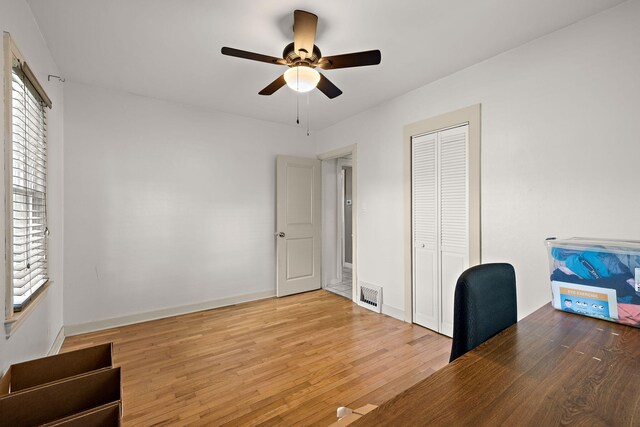 17270 Taft Rd, Spring Lake, MI 49456 - unfurnished office featuring a ceiling fan, light wood-style floors, and baseboards