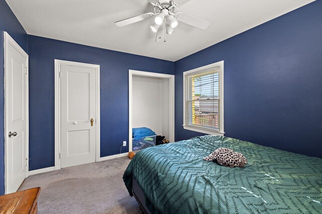 17270 Taft Rd, Spring Lake, MI 49456 - bedroom with carpet, baseboards, and a ceiling fan