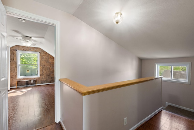 17270 Taft Rd, Spring Lake, MI 49456 - hall with vaulted ceiling, hardwood / wood-style floors, healthy amount of natural light, and an upstairs landing