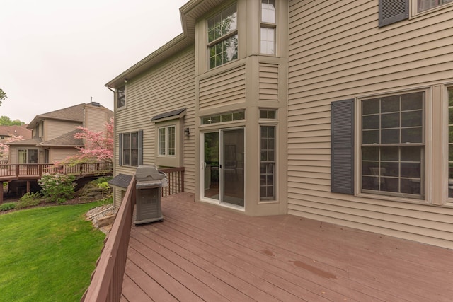 1218 Waterways Dr, Ann Arbor, MI 48108 - wooden deck with a yard and a grill