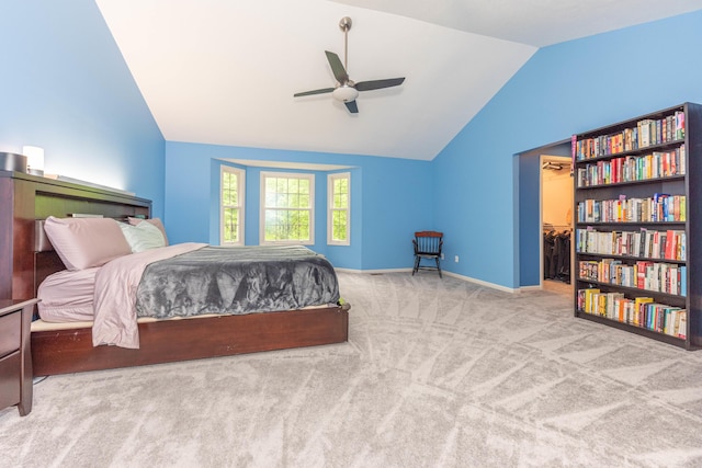 1218 Waterways Dr, Ann Arbor, MI 48108 - carpeted bedroom featuring lofted ceiling, ceiling fan, baseboards, and a walk in closet