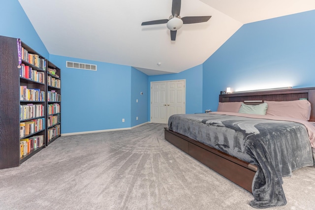 1218 Waterways Dr, Ann Arbor, MI 48108 - carpeted bedroom featuring vaulted ceiling, a closet, ceiling fan, and baseboards
