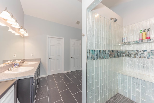 1218 Waterways Dr, Ann Arbor, MI 48108 - full bathroom with a walk in shower, tile patterned floors, and double vanity
