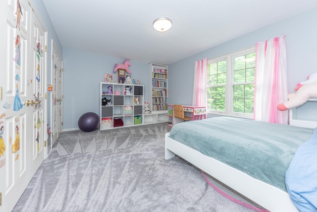 1218 Waterways Dr, Ann Arbor, MI 48108 - carpeted bedroom with baseboards