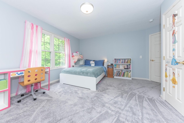 1218 Waterways Dr, Ann Arbor, MI 48108 - carpeted bedroom featuring baseboards