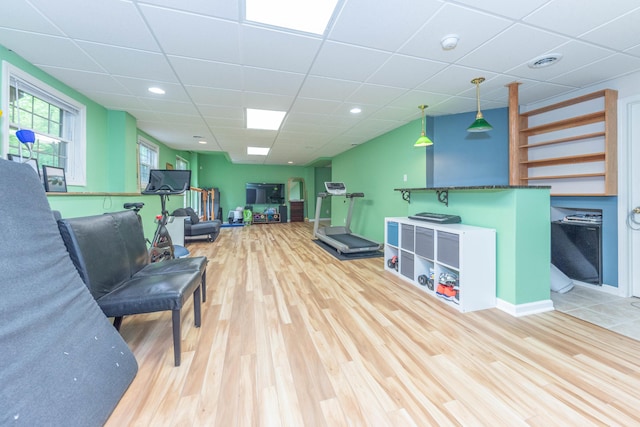 1218 Waterways Dr, Ann Arbor, MI 48108 - living area featuring wood finished floors, a paneled ceiling, baseboards, and recessed lighting