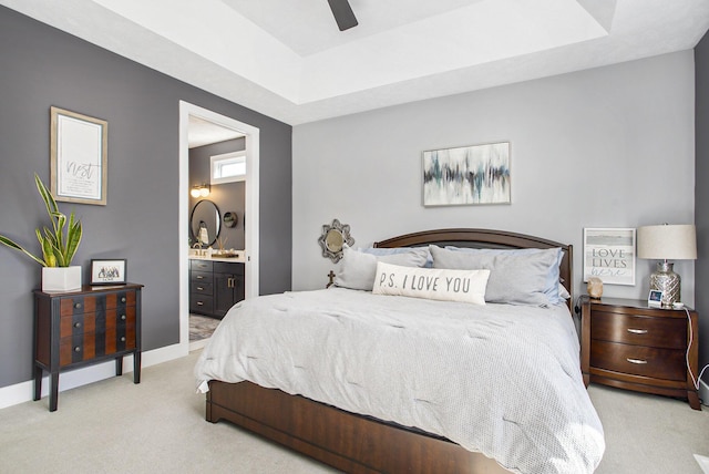 821 Janelle Ct, Portage, MI 49024 - bedroom with carpet floors, a raised ceiling, connected bathroom, and baseboards