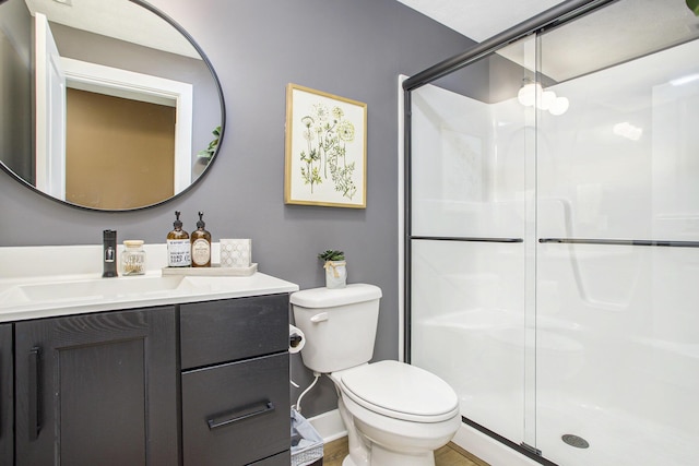 821 Janelle Ct, Portage, MI 49024 - full bath with a stall shower, toilet, vanity, and baseboards