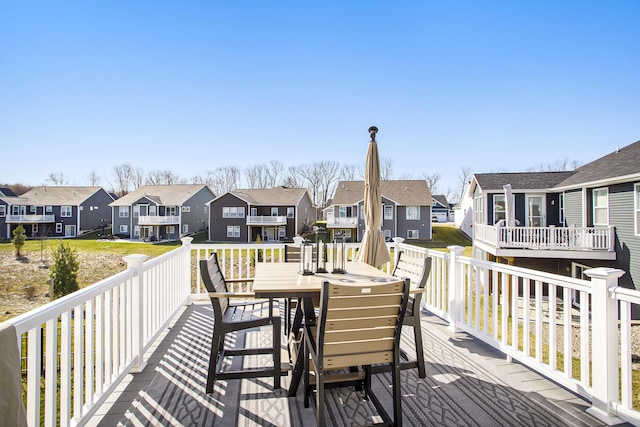 821 Janelle Ct, Portage, MI 49024 - wooden terrace with a residential view and outdoor dining area