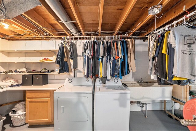 15467 Wisteria Ln, Spring Lake, MI 49456 - laundry room with independent washer and dryer and cabinet space