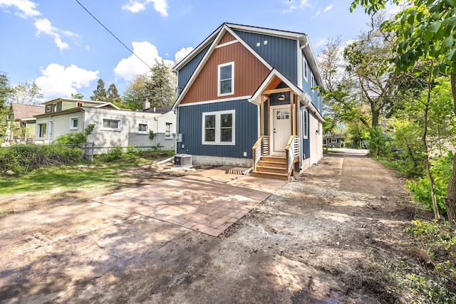 1435 Harpst St, Ann Arbor, MI 48104 - view of front of house featuring central AC and fence