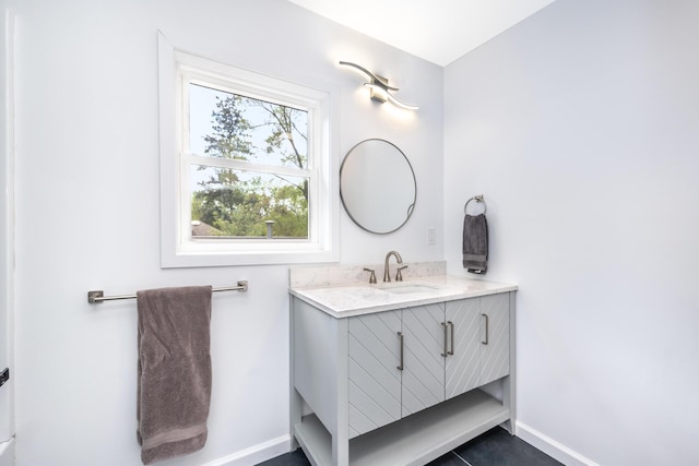 1435 Harpst St, Ann Arbor, MI 48104 - bathroom with baseboards and vanity