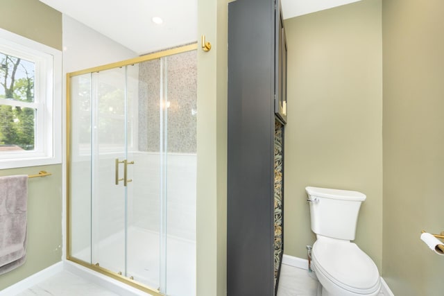1435 Harpst St, Ann Arbor, MI 48104 - bathroom with a shower stall, baseboards, and toilet