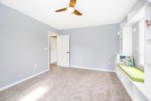 1435 Harpst St, Ann Arbor, MI 48104 - unfurnished bedroom with carpet flooring, a ceiling fan, and baseboards