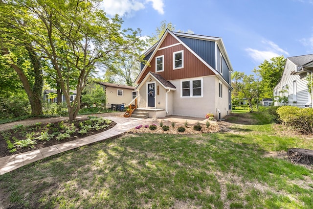 1435 Harpst St, Ann Arbor, MI 48104 - view of front of house featuring a front yard