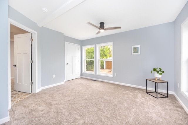 1435 Harpst St, Ann Arbor, MI 48104 - unfurnished bedroom featuring carpet flooring, baseboards, and ceiling fan