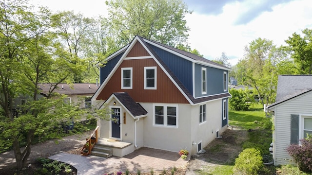 1435 Harpst St, Ann Arbor, MI 48104 - back of house featuring roof with shingles