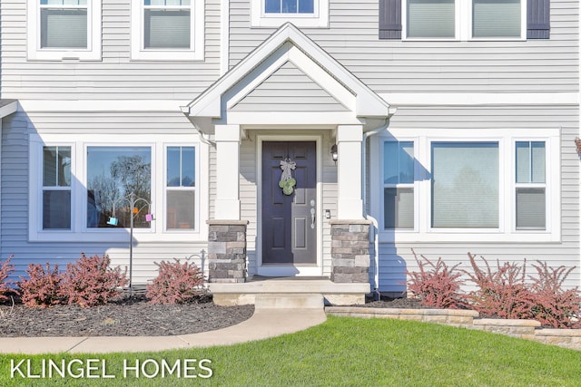 9235 Bigleaf Dr, West Olive, MI 49460 - doorway to property with stone siding