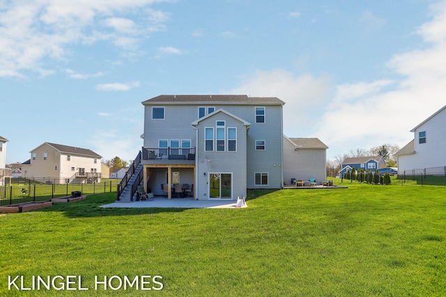 9235 Bigleaf Dr, West Olive, MI 49460 - rear view of property with stairway, a patio, a wooden deck, and outdoor lounge area