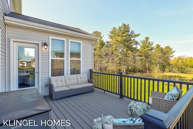 9235 Bigleaf Dr, West Olive, MI 49460 - deck featuring a yard and an outdoor hangout area